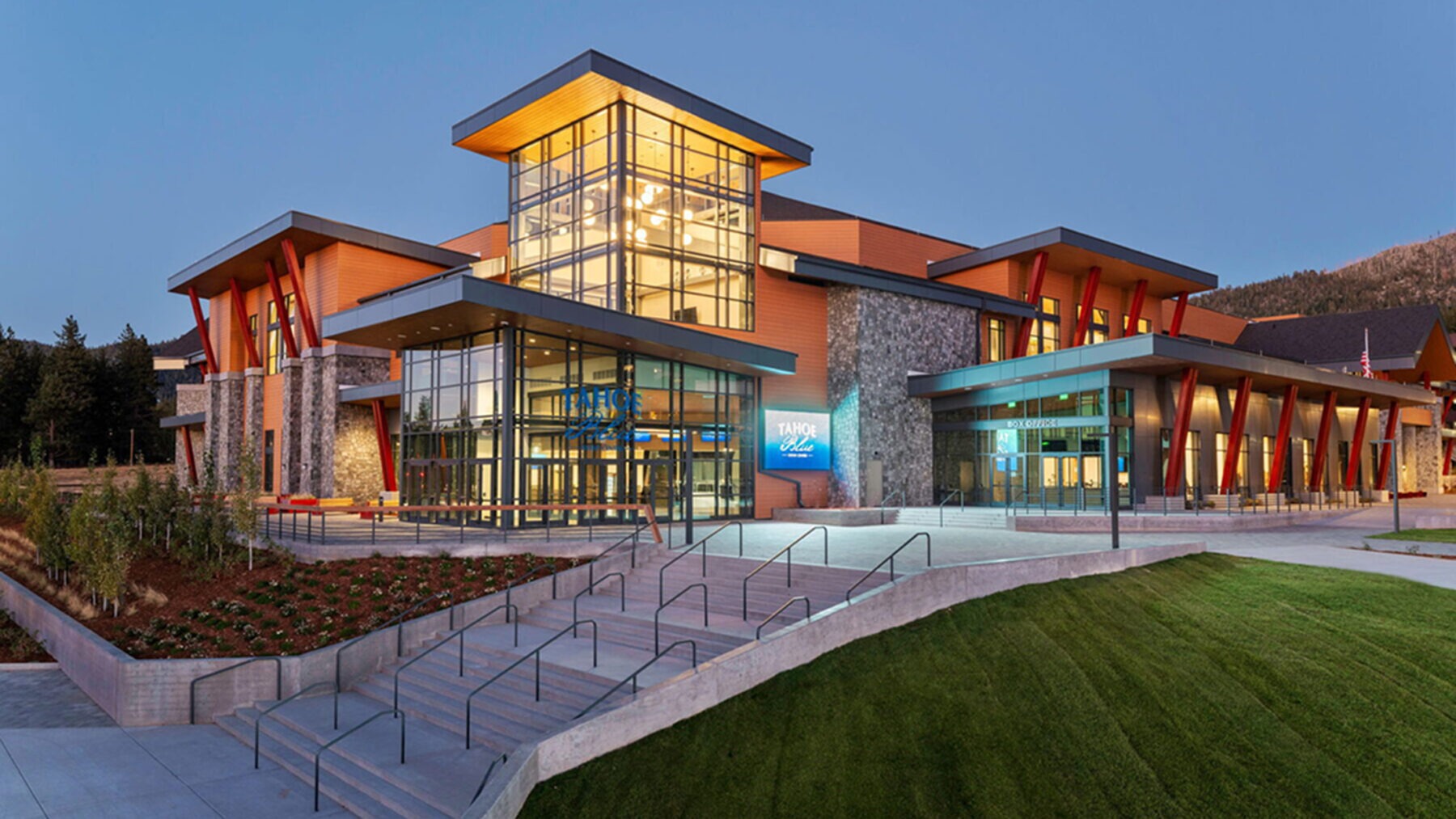 Exterior of the Tahoe Blue Event Center lit up at twilight