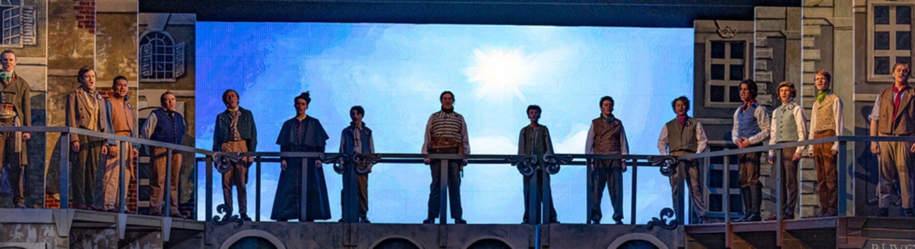 Darien High School Video Wall providing the background during a production of Les Miserables